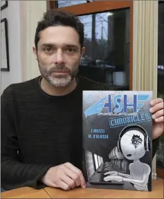  ??  ?? Clonard’s Federico Mazzei with the graphic novel.