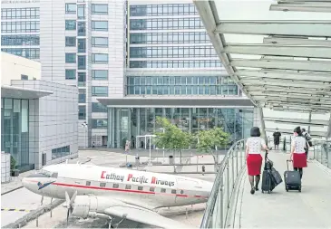  ?? NYT ?? Cathay Pacific flight attendants in Cathay City, the headquarte­rs of the airline in Hong Kong, on May 24.