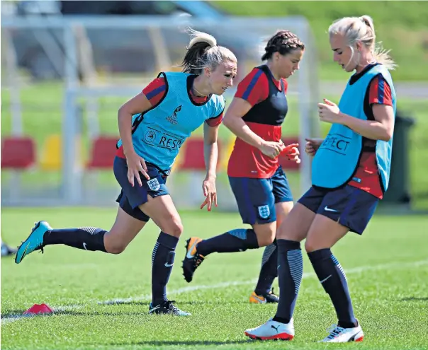  ??  ?? On the run: England forward Toni Duggan (left) trains with her team-mates in Utrecht yesterday ahead of their European Championsh­ip tie against Spain this evening