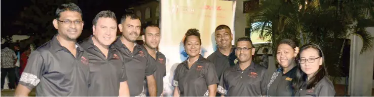  ?? Photo: JOSAIA RALAGO. ?? DHL staff with the country manager Mark Komene (second from left).