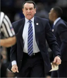  ?? PAUL BEATY —ASSOCIATED PRESS ?? Duke coach Mike Krzyzewski yells to his players during the first half against Michigan State on Nov. 14 in Chicago.