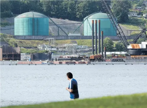  ?? JONATHAN HAYWARD /THE CANADIAN PRESS ?? Kinder Morgan’s Trans Mountain marine terminal in Burnaby, B.C.