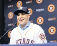  ?? AP PHOTO ?? In this Dec. 5, 2016, file photo, outfielder Carlos Beltran smiles during a news conference to announce his signing a one-year contract with the Houston Astros, in Houston. Beltran is retiring after winning his first World Series title in his 20th...