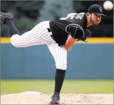  ?? Jack Dempsey ?? The Associated Press Colorado Rockies starting pitcher Chad Bettis delivers during the first inning against the Atlanta Braves on Monday in Denver.