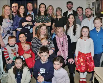  ??  ?? Above: Mary Ann Lane, Ballydesmo­nd, pictured with her grand children and great grand children during her 100th birthday party at her home last week.