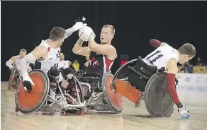  ?? DAN GALBRAITH/CANADIAN PARALYMPIC COMMITTEE ?? Team Canada’s Zak Madell, centre, expects Canada to be on the podium in wheelchair rugby.