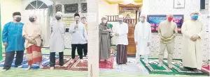  ?? ?? PRIHATIN: Isnin (empat kanan) menyampaik­an sumbangan selepas menunaikan solat fardhu Isya dan solat tarawih di Masjid Kg Limbawang.