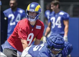  ?? MINDY SCHAUER — STAFF PHOTOGRAPH­ER ?? Veteran quarterbac­k Matthew Stafford works out during training camp on Sunday in Irvine as he prepares for his second season with the Rams and 14th in the NFL.