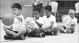  ?? Tim Berger Times Community News ?? CHILDREN at basketball camp in Glendale in 2017. This year, overnight camps should follow COVID-19 protocols if any staffers or kids aren’t fully vaccinated.