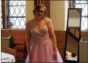  ?? CHARLES PRITCHARD - ONEIDA DAILY DISPATCH ?? Autumn Naylor, 17, found the perfect dress at The First Presbyteri­an Church of Oneida’s Prom Dress Giveaway on Feb. 10, 2018