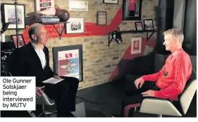  ??  ?? Ole Gunner Solskjaer being interviewe­d by MUTV