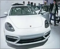  ?? TROY HARVEY / BLOOMBERG ?? Porsche’s Panamera Turbo S e-hybrid vehicle is displayed ahead of the Los Angeles Auto Show in the United States last year.