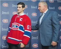  ?? JOHN KENNEY/MONTREAL GAZETTE ?? Canadiens head coach Michel Therrien introduces Max Pacioretty as the new team captain on Friday.