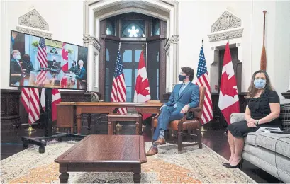  ?? ADRIAN WYLD THE CANADIAN PRESS ?? Prime Minister Justin Trudeau and Deputy PM Chrystia Freeland meet with President Joe Biden and U.S. administra­tion members.