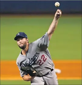  ?? David Santiago Miami Herald ?? CLAYTON KERSHAW struck out 10 batters and walked none on the way to his 165th career win, a 9-1 romp over the Miami Marlins. His ERA dipped to 2.63.