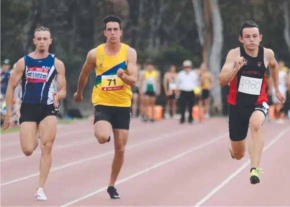  ??  ?? PHOTO FINISH: Tasmanian sprinter Jack Hale (right) gives his all in a desperatel­y tight 100m race in Canberra yesterday.