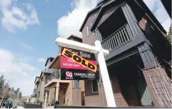  ?? — Reuters ?? Sold homes are seen in the southwest area of Portland, Oregon.