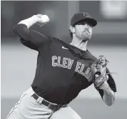  ?? CHARLIE RIEDEL AP ?? Cleveland’s Shane Bieber was named the unanimous winner of the A.L. Cy Young Award after leading or tying the major leagues in ERA, wins and strikeouts.