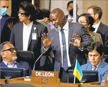  ?? L.A. COUNCILMAN Gary Coronado Los Angeles Times ?? Marqueece Harris-Dawson, center, is flanked by colleagues Gil Cedillo, left, and Kevin de León at a recent meeting.