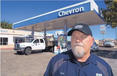  ?? GREG SORBER/JOURNAL ?? Ron Schorr, owner of a Chevron station in Paradise Hills, has made costly changes to his business as a result of an uptick in armed robberies and vandalism.