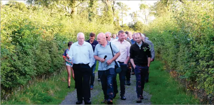  ?? ?? David Henderson (centre), host farmer leading the group of members of Fermanagh Grassland Club on the farm walk.