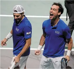  ?? ?? Oh, what joy: Italy’s Simone bolelli and Fabio Fognini (right) celebrate after winning their doubles match in the quarter final against tommy Paul and Jack Sock of the us in the davis Cup. — Reuters