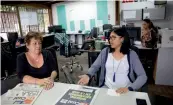  ?? — AP ?? Gloria Villamizar, left, and Luisa Quintero journalist of newspaper TalCual speak during an interview in Caracas, Venezuela, on Thursday.