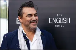  ?? ?? Celebrity chef Todd English, who will operate the Pepper Club in the hotel, reacts Tuesday at a ribbon-cutting ceremony. English is a four-time James Beard Award winner.