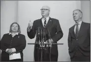  ?? The New York Times/TOM BRENNER ?? Rep. Joseph Crowley (center), D-N.Y., and fellow Democratic lawmakers Linda Sanchez of California and Richard Neal of Massachuse­tts speak out Tuesday on the GOP tax-overhaul proposal.
