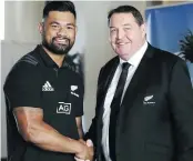  ??  ?? All Blacks coach Steve Hansen congratula­tes Jordan Taufua