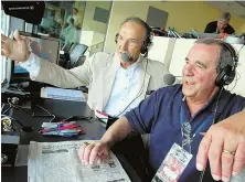  ?? STaff fILE phoTo By MaTT sToNE ?? LEGENDARY TEAM: Gil Santos shares the Patriots radio booth with Gino Cappellett­i during a 2009 preseason game in Philadelph­ia.