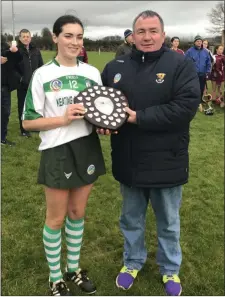  ??  ?? Cloughbawn captain Niamh Kehoe with County Chairman Donnacha Keirns after the victory over Castletown.