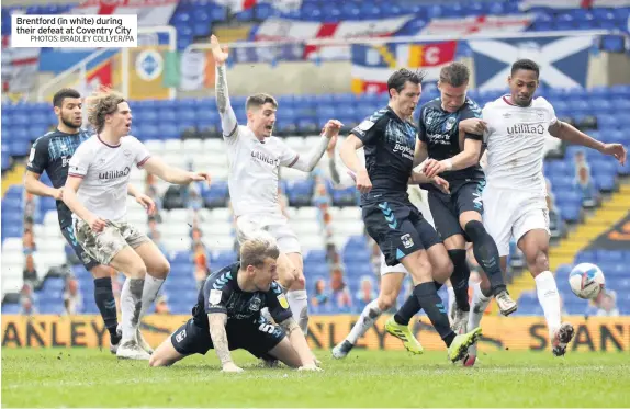  ?? PHOTOS: BRADLEY COLLYER/PA ?? Brentford (in white) during their defeat at Coventry City