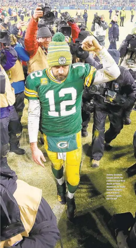  ??  ?? Jimmy Graham (inset) dives for controvers­ial first down in final moments to make Aaron Rodgers and Packers winners again. GETTY/AP