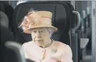  ??  ?? TAKING THE STRAIN: The Queen revealed on the 19-minute journey to Paddington how she loves to travel by train.