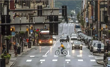  ?? Alexandra Wimley/Post-Gazette ?? A Baltimore developer has revised its plan to build an office tower on Forbes Avenue, shown here, in Oakland.