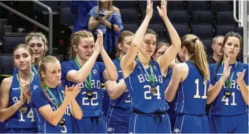  ?? JEFF GILBERT / CONTRIBUTE­D ?? Springboro players clap for head coach Mike Holweger as he is presented with his medal after the Panthers lost to Olmsted Falls in the Division I state final Saturday night at UD Arena.