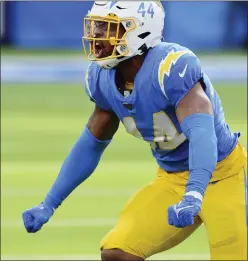  ?? JOHN CORDES/AP IMAGES FOR PANINI ?? Los Angeles Chargers linebacker Kyzir White is full of himself after making a tackle during the first half of a game against Denver last Jan. 2.