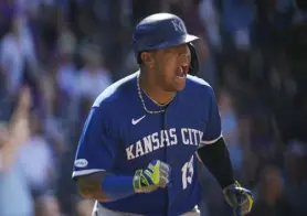  ?? David Zalubowski, The Associated Press ?? Kansas City Royals' Salvador Perez heads up the first-base line after hitting a single to drive in two runs in the ninth inning Sunday at Coors Field.