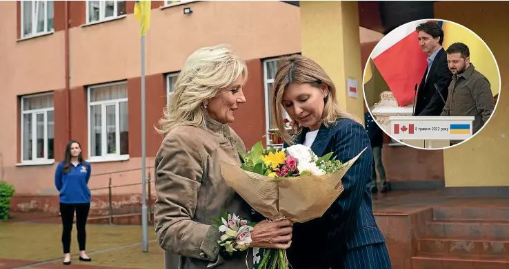  ?? AP/GETTY IMAGES ?? United States first lady Jill Biden greets Olena Zelenska, spouse of Ukrainian President Volodymyr Zelenskyy, outside of School 6, a public school that has taken in displaced students in Uzhhorod on Sunday. Inset: Canadian Prime Minister Justin Trudeau, left, and President Zelenskyy arrive for a joint news conference in Kyiv.