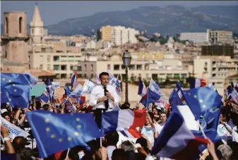  ?? Laurent Cipriani / Associated Press ?? President Emmanuel Macron speaks during a campaign rally in Marseille in southern France. Far-right leader Marine Le Pen is trying to unseat Macron in next Sunday’s election.