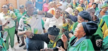  ?? | PHANDO JIKELO African News Agency ( ANA) ?? ANC General Secretary General, and deputy president candidate, Paul Mashatile danced with members of the ANC at the KTC Community hall in Nyanga where the party hosted a rally ahead of the ward 38 by-elections on Wednesday.