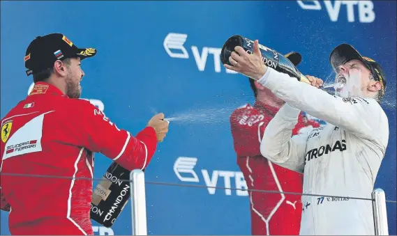  ?? FOTO: EFE ?? Sebastian Vettel definió a Valtteri Bottas en el podio como “el hombre del día” y el finlandés subrayó ante la atenta mirada de su equipo que su único objetivo es ser campeón del mundo