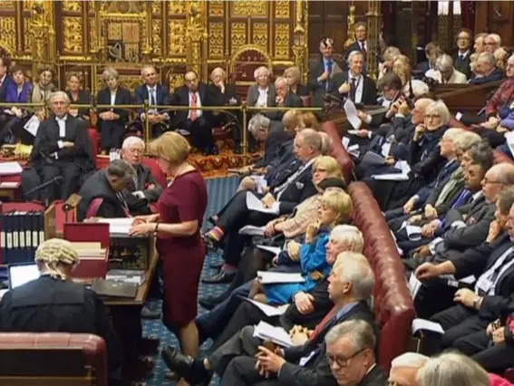  ??  ?? Theresa May watches from the steps of the Queen’s golden throne, as the House of Lords debates the Brexit bill yesterday (PA)