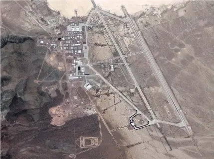 ?? DIGITALGLO­BE VIA GETTY IMAGES ?? A DigitalGlo­be satellite image of a runway in Area 51. The top secret United States Air Force facility commonly known as Area 51 is a remote detachment of Edwards Air Force Base, within the Nevada Test and Training Range.