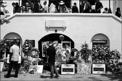  ?? TRAVIS DOVE / NEW YORK TIMES FILE (2015) ?? A service lets out at Emanuel African Methodist Episcopal Church just before a funeral for Depayne Middleton-doctor, who was killed June 28, 2015, in the mass shooting at the church in Charleston, S.C. The screed of an 18-year-old New Yorker accused Saturday’s mass shooting at a Buffalo supermarke­t connects it with a belief shared by gunmen in previous massacres.