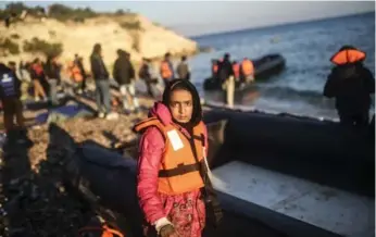  ?? BULENT KILIC/AFP/GETTY IMAGES ?? More than 700,000 people seeking refuge have come to Europe so far this year by crossing the Mediterran­ean.