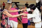  ?? Photos by Doug Walker, RN-T ?? LEFT: Ms. Senior Georgia Sandy Komiskey (from left) of Alpharetta and Joe ‘Elvis’ Dowdy of Rome dance at the Senior Inforum.