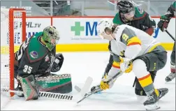  ?? Ross D. Franklin The Associated Press ?? Arizona goaltender Darcy Kuemper makes a save on a shot by Cody Glass. Glass would later score his first goal of the season in the Knights’ 5-2 loss to the Coyotes on Friday.