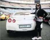  ??  ?? One of Durban’s fastest female racers, Karen Naidoo, with her Nissan GTR R35